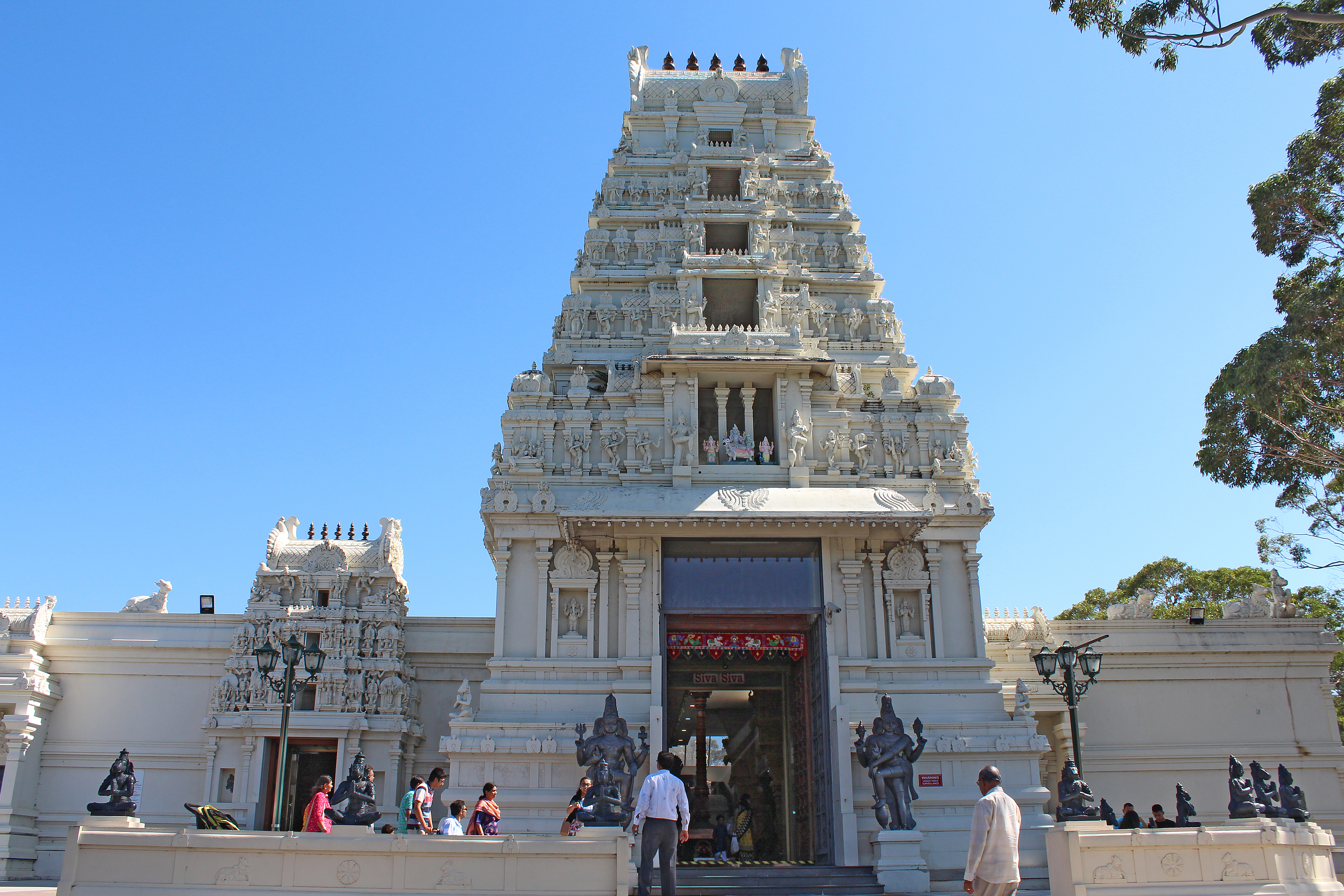 The intricately carved pagoda at the Sri Venkateswara Temple.